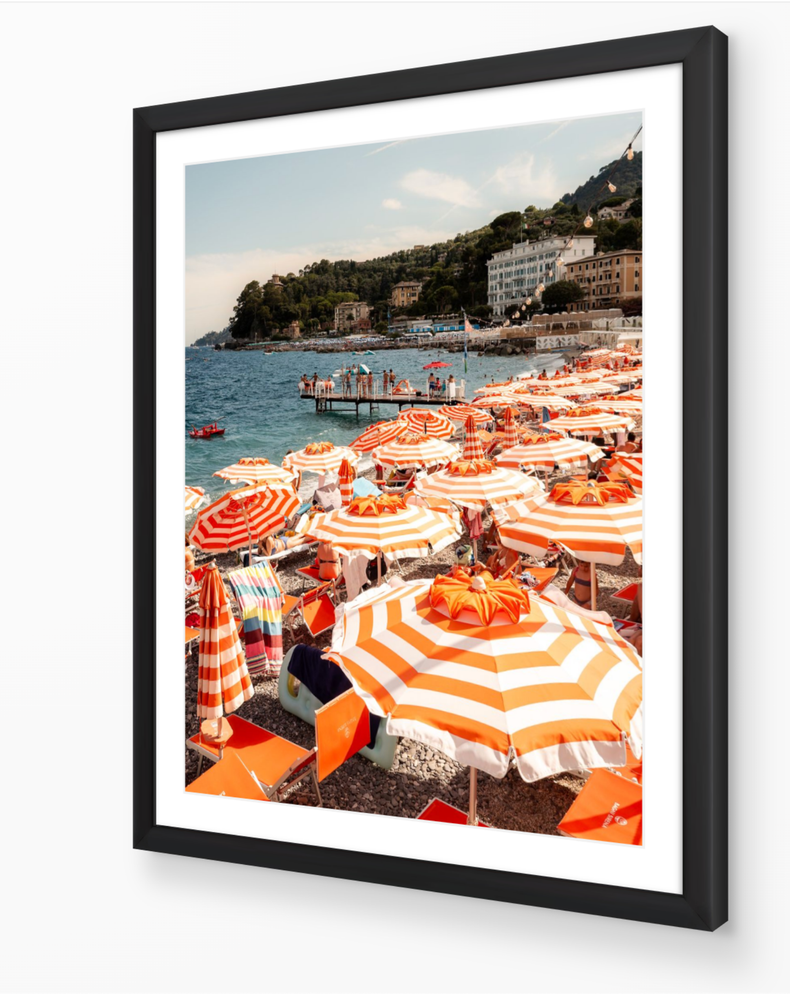 Santa Margherita vertical fine-art print in black frame — orange-and-white umbrellas on the Italian Riviera by Sam Smeaton.