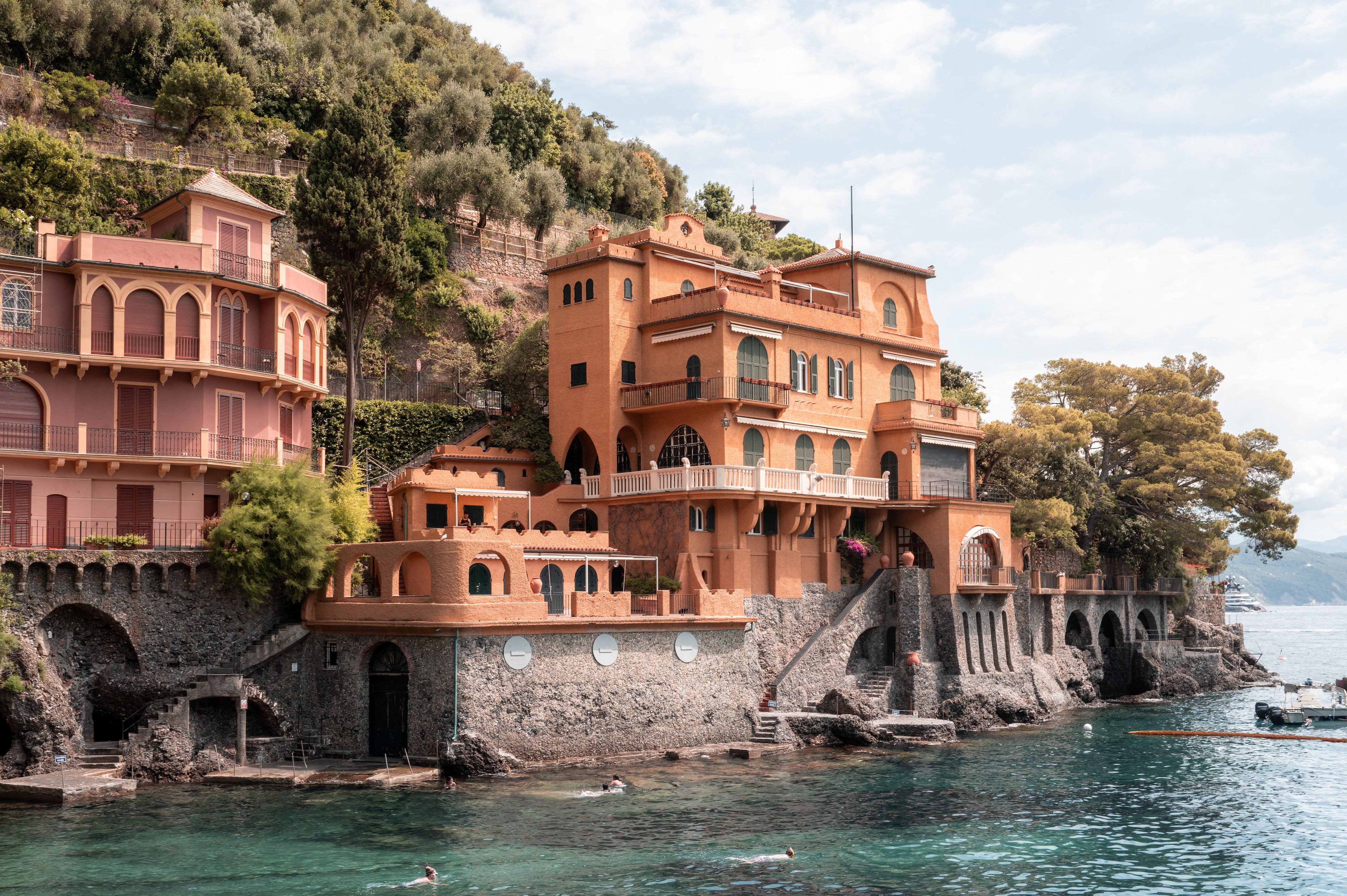 Fine-art photography print of Villa Coral – Portofino by Sam Smeaton — coral-hued villas and turquoise sea along the Italian Riviera, printed on premium matte fine-art paper, 60 × 40 cm.