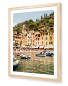 Portofino III fine-art print by Sam Smeaton — Italian Riviera harbour scene with warm façades and tranquil reflections, framed in natural oak for timeless coastal warmth.