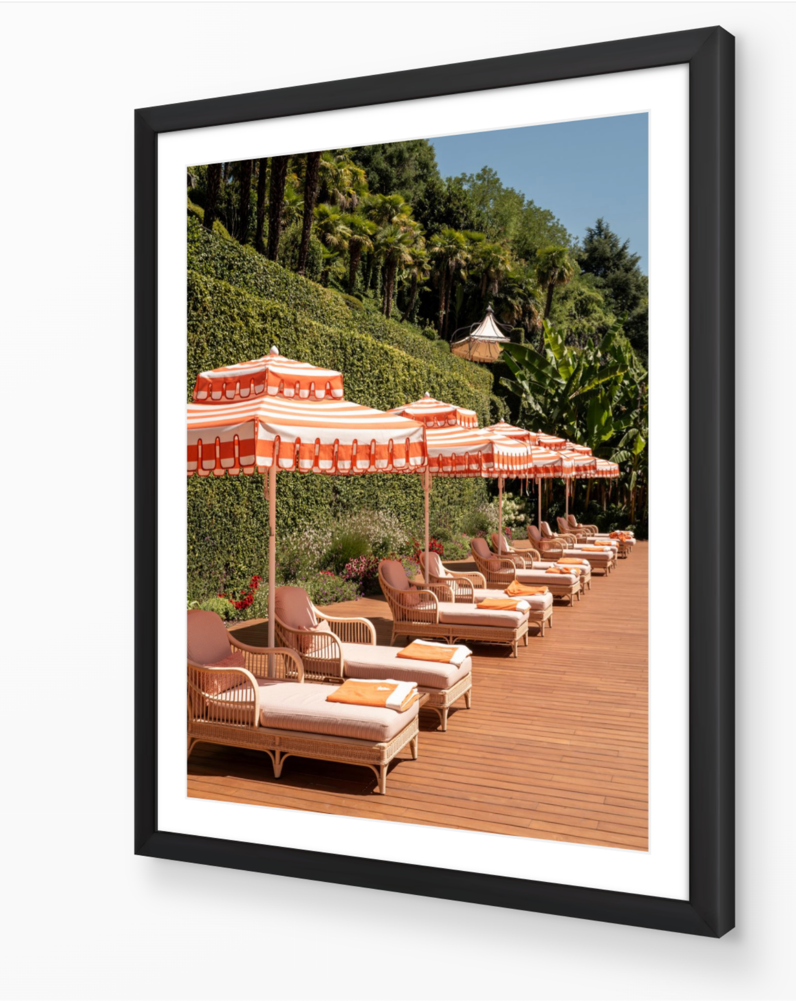 Sun Loungers of Tremezzo fine-art print by Sam Smeaton — elegant Lake Como sunbeds and umbrellas framed in black for rich depth and Mediterranean contrast.