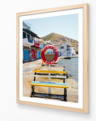 Klima – Milos fine-art print in oak frame by Sam Smeaton — Mediterranean coastal artwork celebrating bright boathouses and calm island life