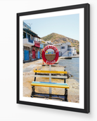 Klima – Milos fine-art print in black frame by Sam Smeaton — Greek island wall art featuring colourful fishing houses by the Aegean Sea