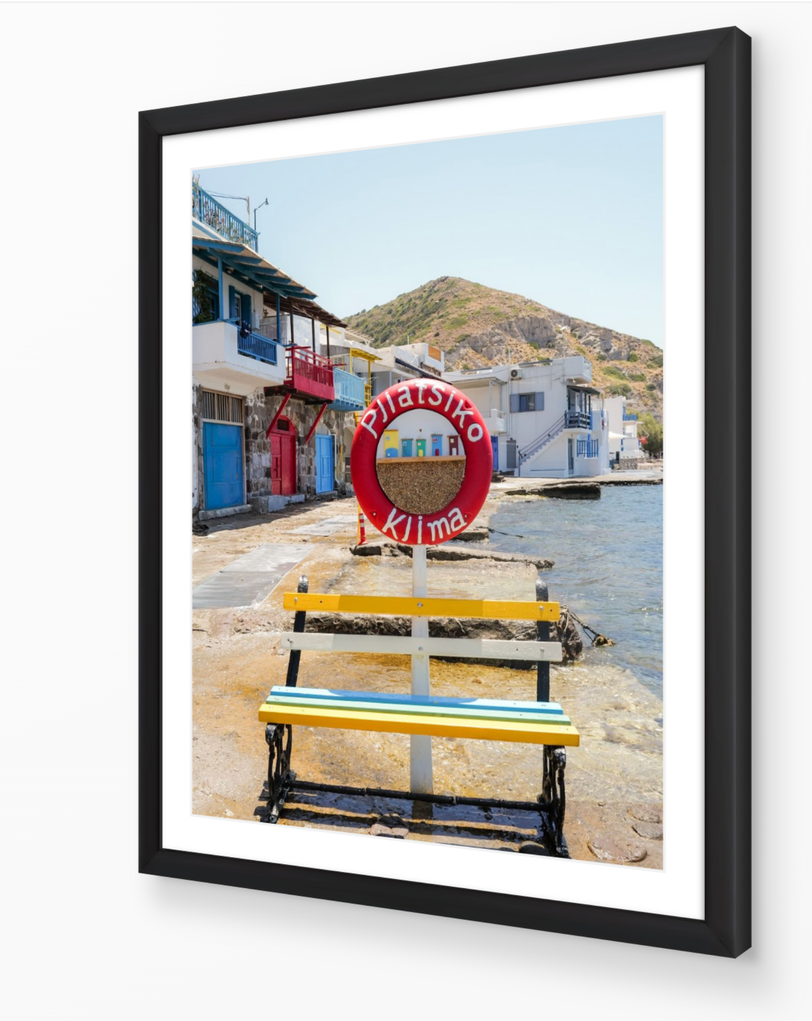 Klima – Milos fine-art print in black frame by Sam Smeaton — Greek island wall art featuring colourful fishing houses by the Aegean Sea