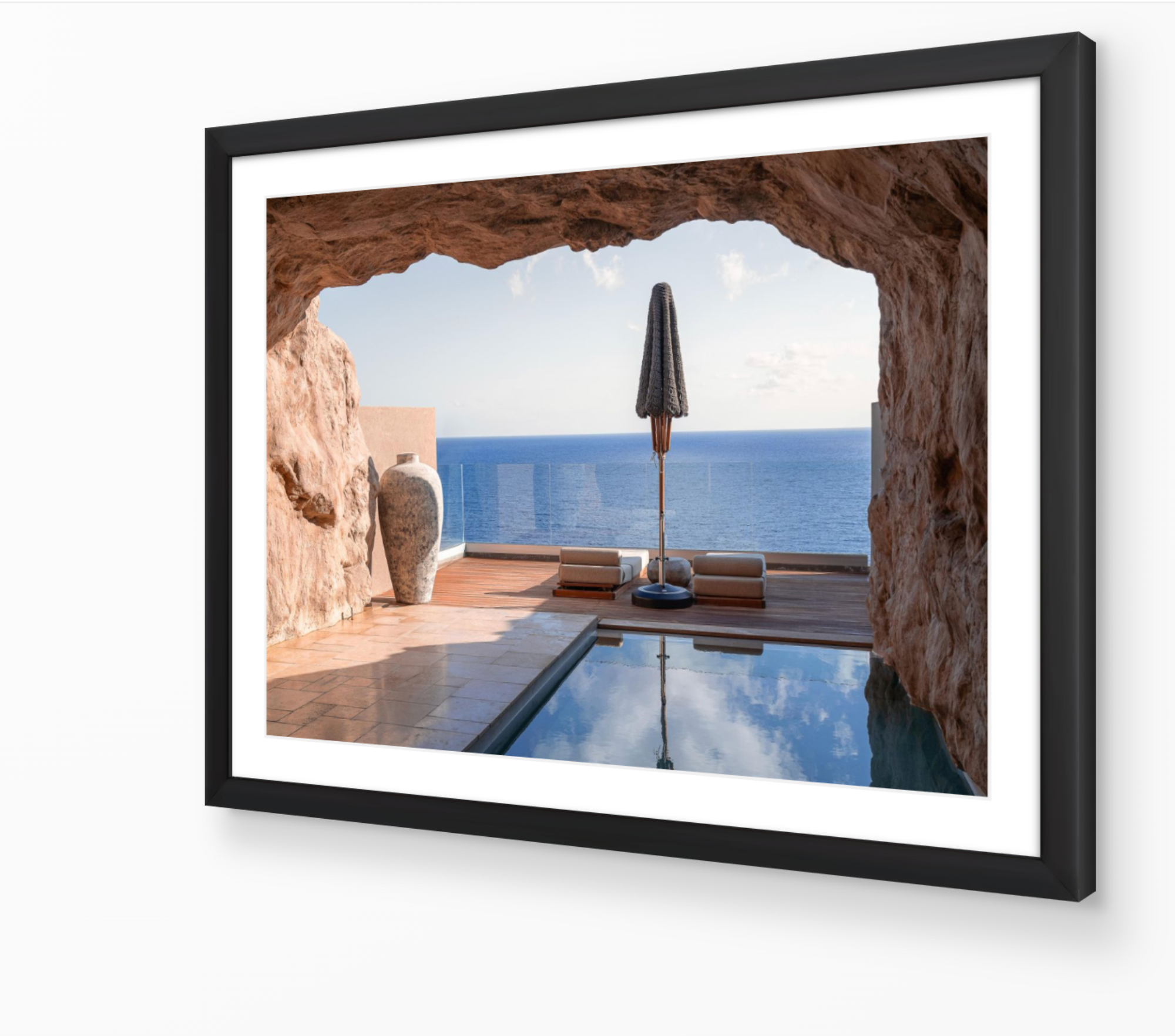 Cave View – Crete fine-art print in black frame by Sam Smeaton — coastal rock formation and blue Aegean sea view from a sunlit cave in Crete