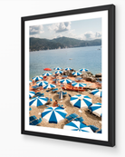 Azure Umbrellas framed print in black wood frame – Italian Riviera coastal photography
