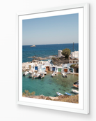 Mandrakia I – Milos fine-art print in white frame by Sam Smeaton — serene Greek coastal village photography with boats and blue water
