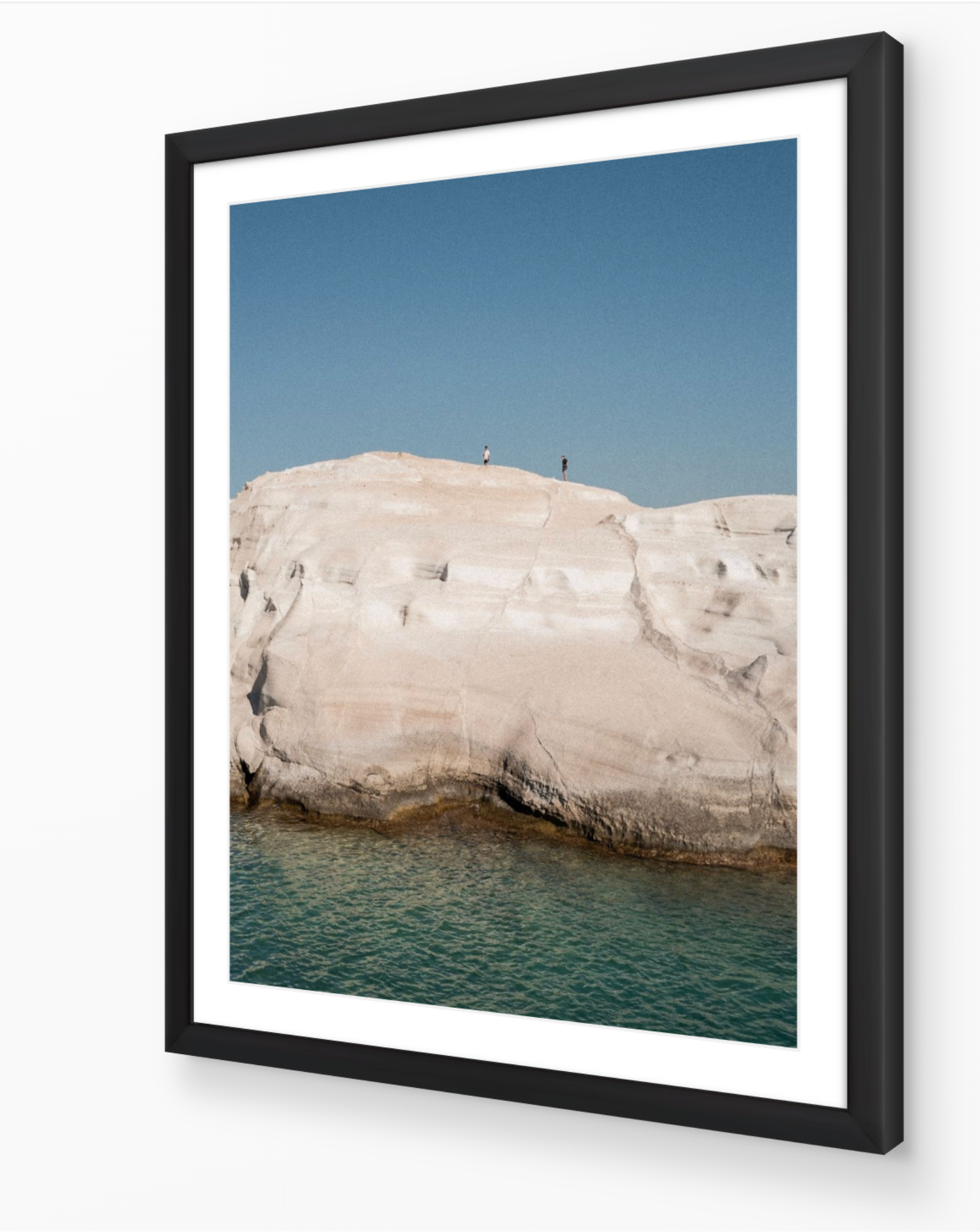 Sarakiniko II – Milos fine-art print in black frame by Sam Smeaton — minimalist Greek seascape photography featuring white cliffs and calm turquoise sea
