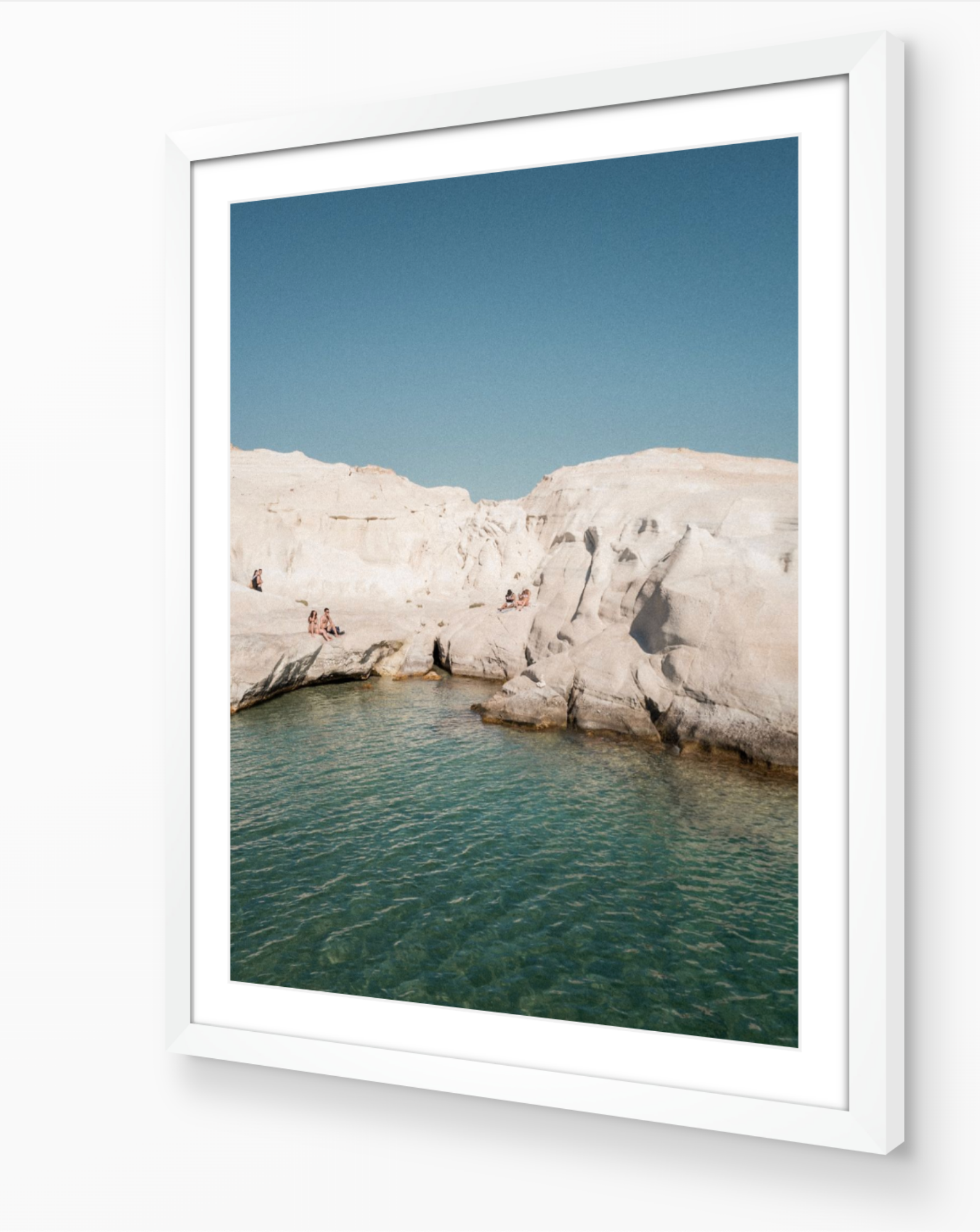Sarakiniko I – Milos fine-art print in white frame by Sam Smeaton — serene Milos seascape wall art with sculpted cliffs and tranquil Aegean tones