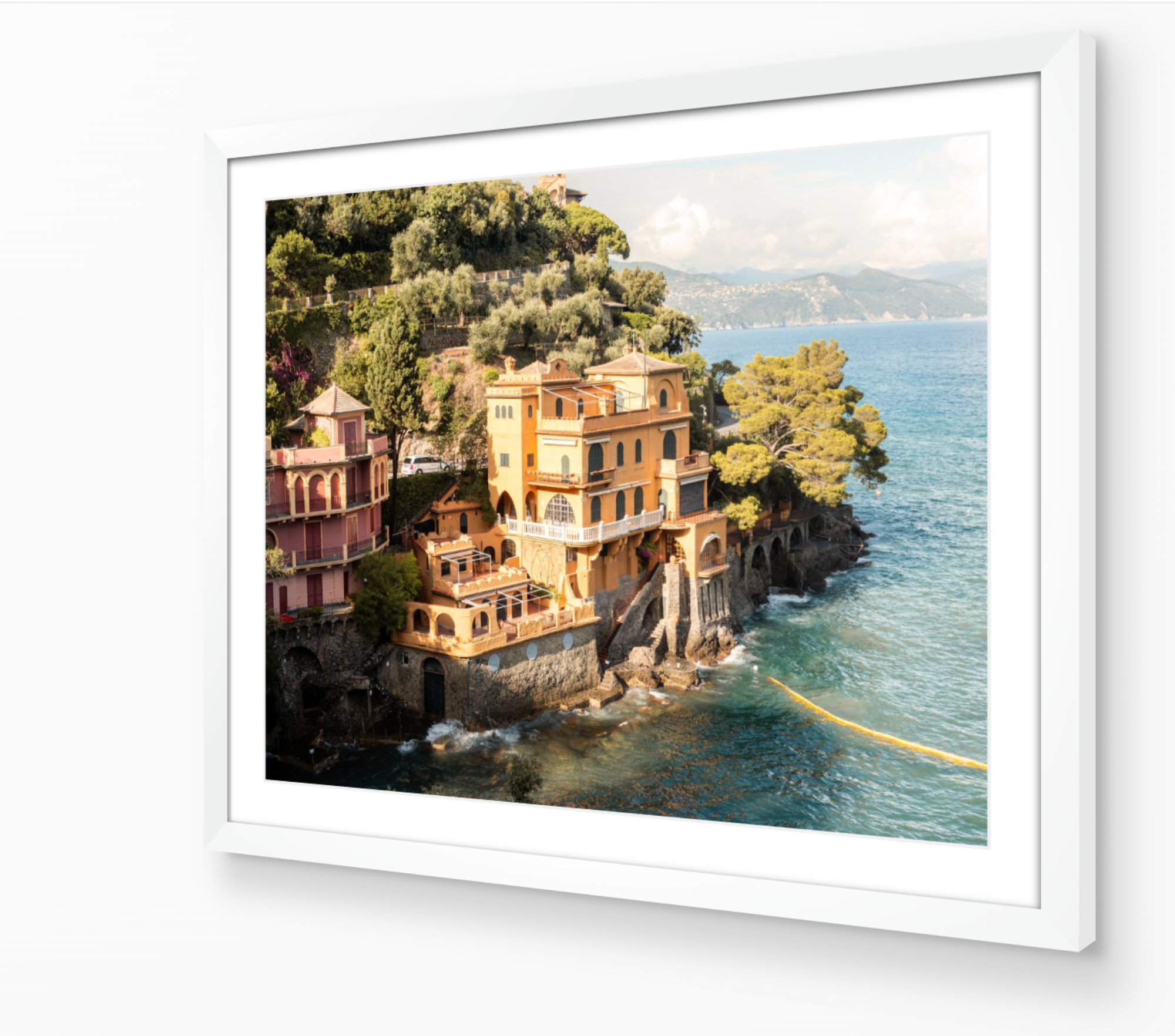 Portofino Italy fine-art print in white frame — warm coastal tones captured by Sam Smeaton.