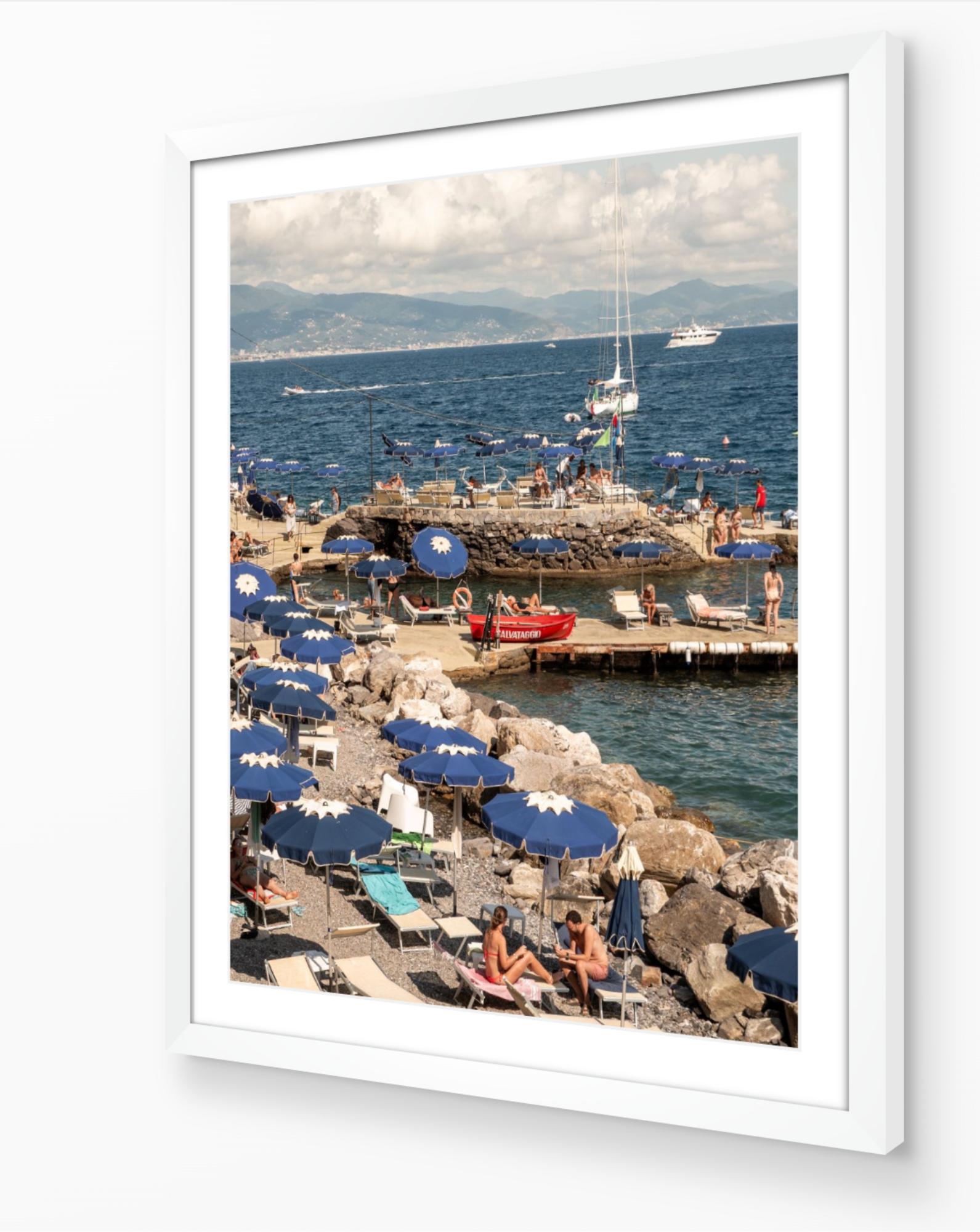 Santa Margherita fine-art print by Sam Smeaton — Italian Riviera blue umbrellas and shoreline, framed in modern white frame for a clean minimalist finish.