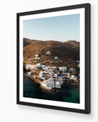 Sifnos Serenity fine-art print in black frame by Sam Smeaton — minimalist Greek island architecture on sunlit hills beside the Aegean Sea