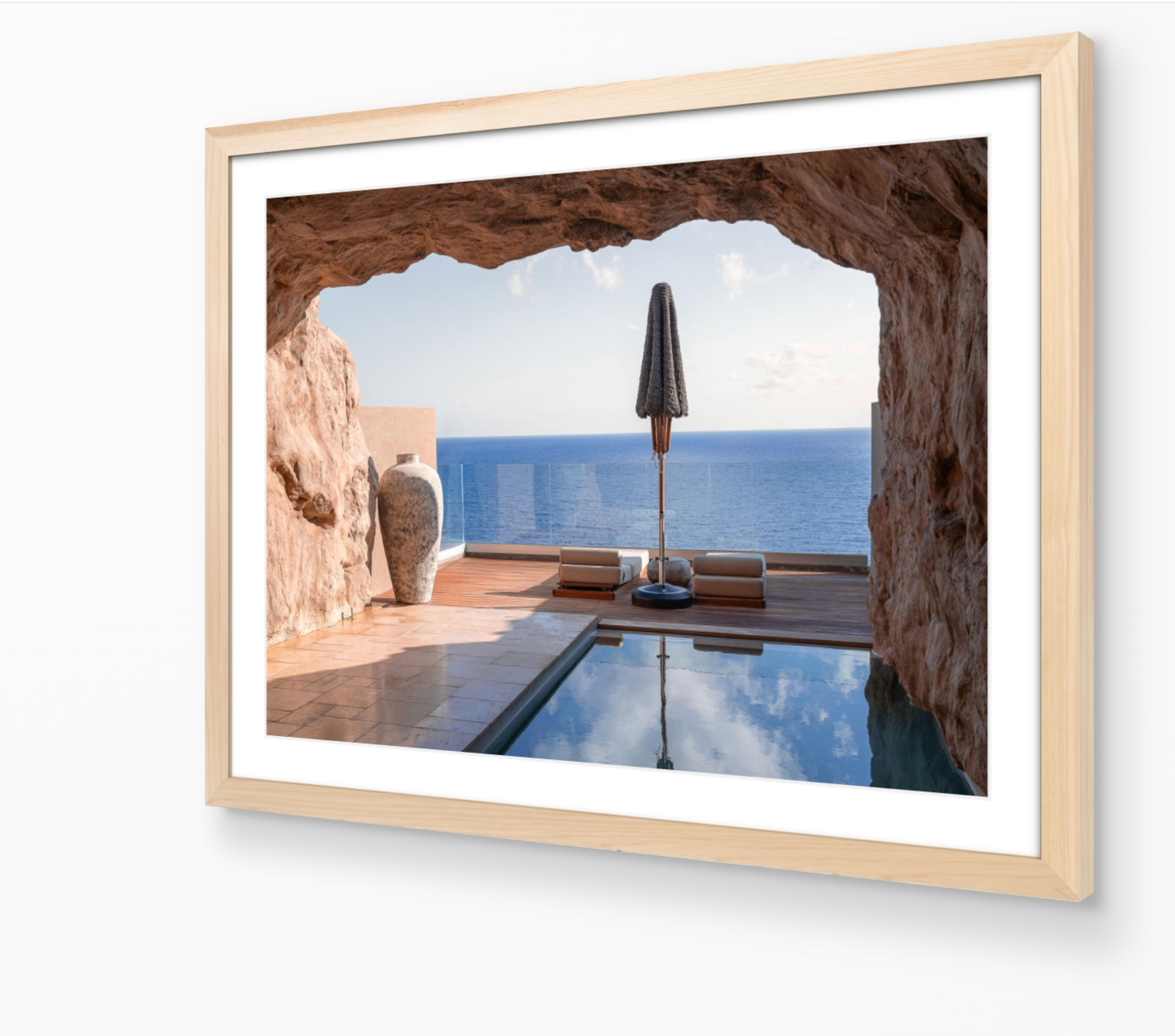 Cave View – Crete fine-art print in oak frame by Sam Smeaton — serene Mediterranean seascape viewed from within a golden rock cave on the island of Crete