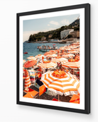 Santa Margherita vertical fine-art print in black frame — orange-and-white umbrellas on the Italian Riviera by Sam Smeaton.