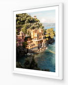 Portofino vertical fine-art print in white frame — sunlit Mediterranean architecture captured by Sam Smeaton.
