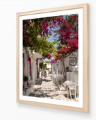 Paros Bougainvillea Lane fine-art print in oak frame by Sam Smeaton — Greek island wall art celebrating Cycladic charm and colour