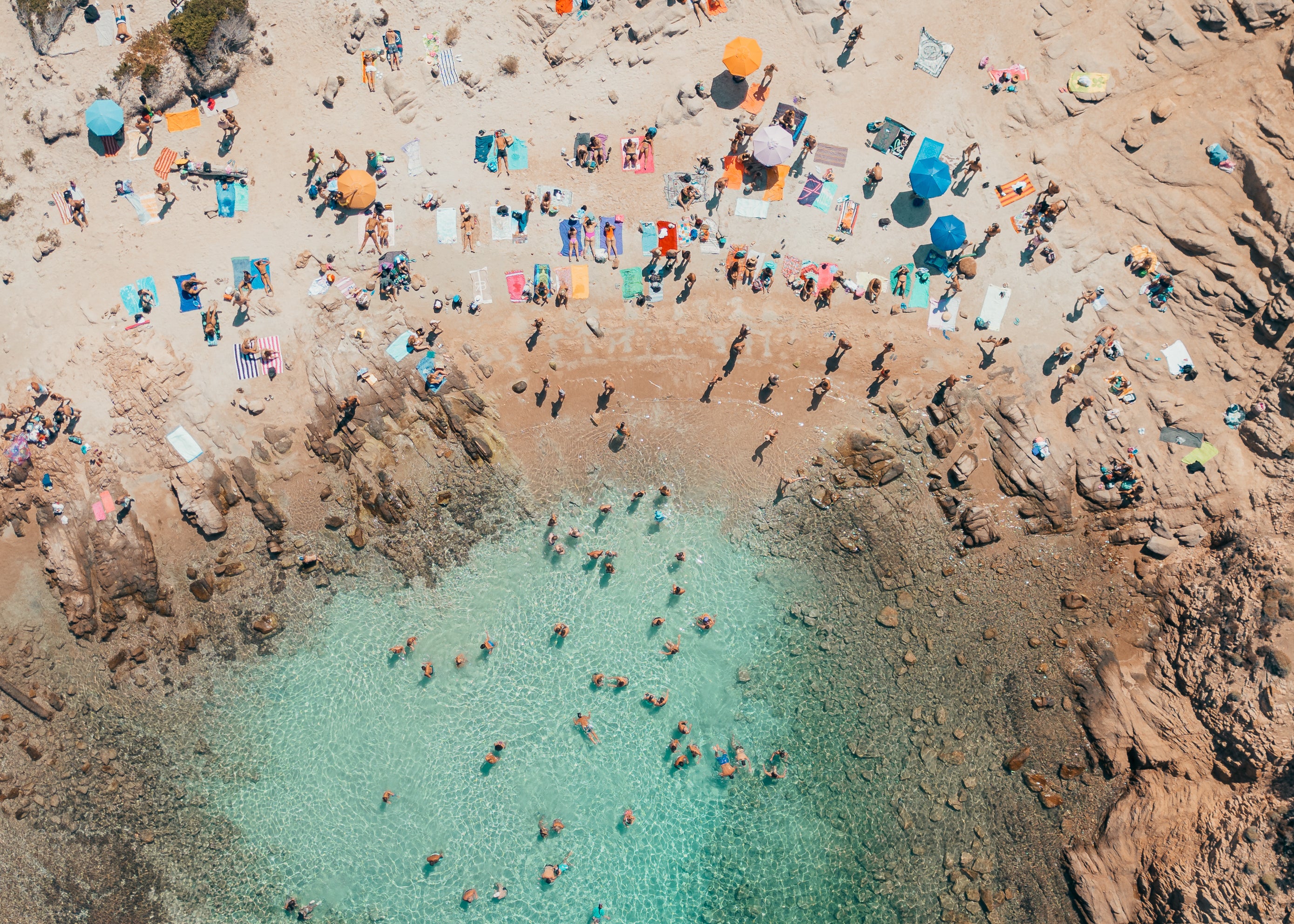 Fine-art photography print of Costa Smeralda (Horizontal Edition) by Sam Smeaton — aerial view of Sardinia’s turquoise waters, granite coastline, and umbrellas, printed on premium matte fine-art paper, 60 × 40 cm.