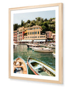 Portofino I fine-art print by Sam Smeaton — Portofino’s tranquil harbour and pastel buildings, framed in natural oak for a warm, timeless Mediterranean look.
