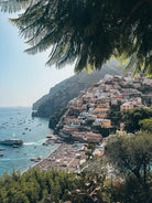Positano I vertical fine-art print by Sam Smeaton — Amalfi Coast Italy photography featuring pastel villas, turquoise water, and Mediterranean greenery