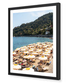 Santa Margherita fine-art print by Sam Smeaton — golden beach umbrellas and blue sea on the Italian Riviera, framed in elegant black for timeless contrast.