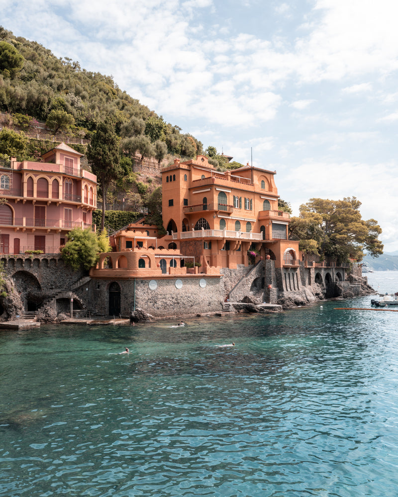 Fine-art photography print of Villa Coral – Portofino (Vertical Edition) by Sam Smeaton — coral villas and turquoise sea along the Italian Riviera, printed on premium matte fine-art paper, 50 × 75 cm.