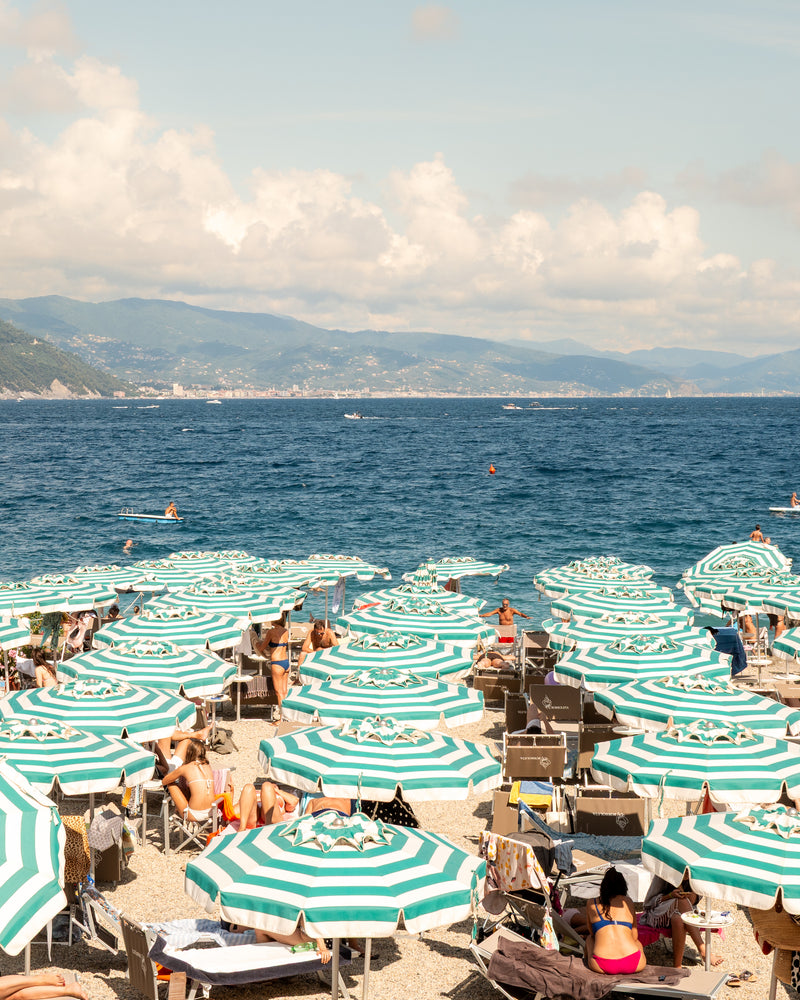 Fine-art photography print of Santa Margherita by Sam Smeaton — mint-green umbrellas and blue Ligurian Sea, Italian Riviera wall art on archival matte paper