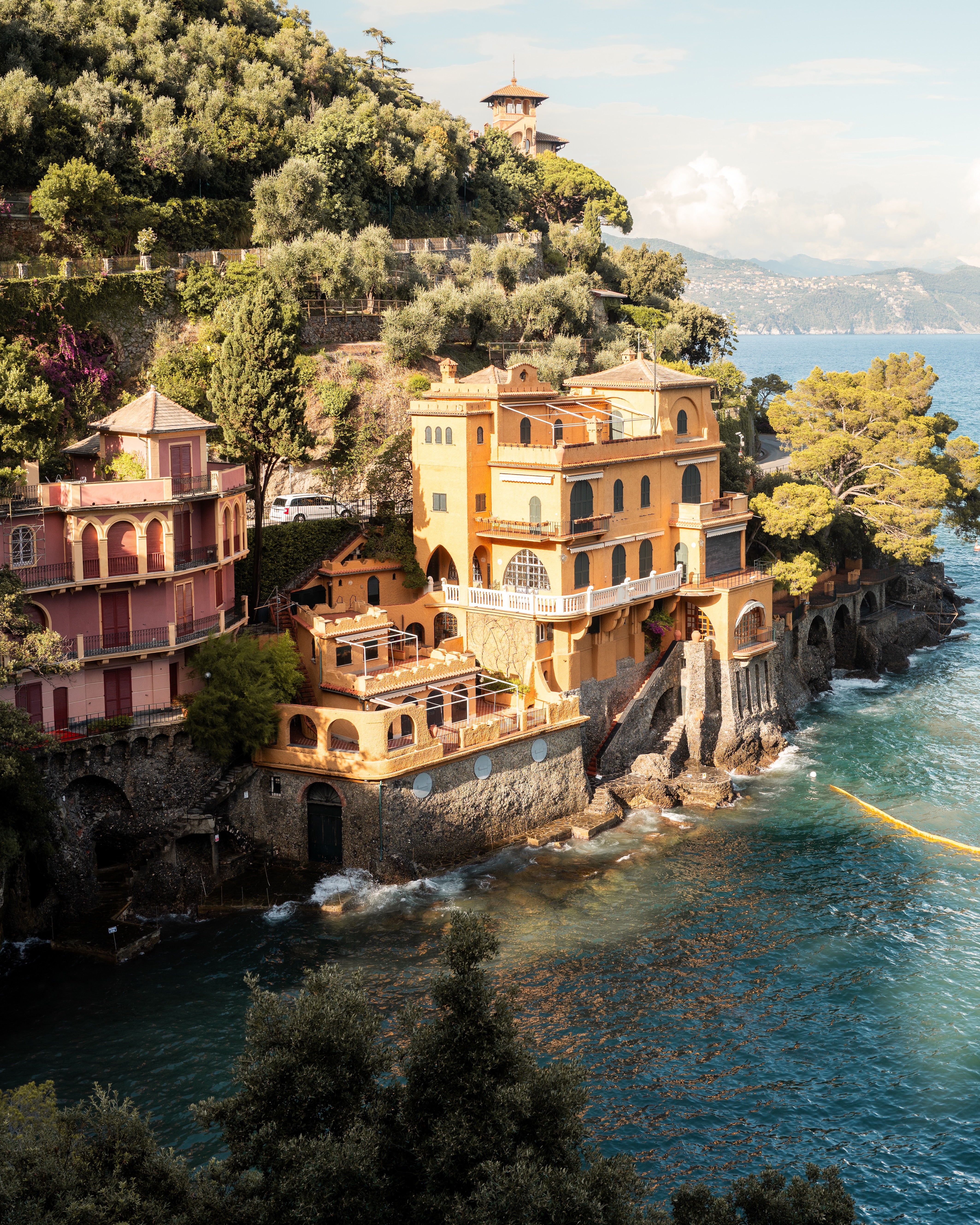 Vertical fine-art photography print of Portofino Italy by Sam Smeaton — warm Italian Riviera pastel tones.