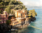 Fine-art landscape photograph of Portofino Italy by Sam Smeaton — sunlit pastel harbour in warm Mediterranean tones.