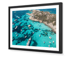 La Maddalena fine-art print by Sam Smeaton — vibrant turquoise waters and boats of Sardinia framed in black for striking contrast and coastal depth.