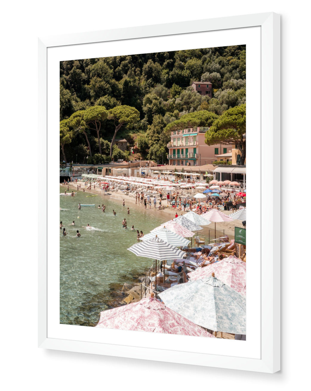 Paraggi Beach fine-art print by Sam Smeaton — Italian Riviera striped umbrellas and turquoise water, framed in modern white for a clean coastal finish.