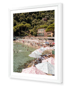 Paraggi Beach fine-art print by Sam Smeaton — Italian Riviera striped umbrellas and turquoise water, framed in modern white for a clean coastal finish.
