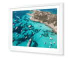 La Maddalena fine-art print by Sam Smeaton — Sardinia’s crystal bay and granite coast framed in white for a modern, Mediterranean gallery look.