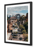 The Rocks – Sydney Harbour Bridge fine-art print in black frame by Sam Smeaton — architectural Sydney skyline featuring the Harbour Bridge and heritage rooftops in warm tones