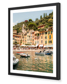 Portofino III fine-art print by Sam Smeaton — Italian Riviera harbour with sunlit façades and boats, framed in black for striking coastal contrast.